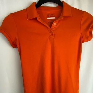 Girls orange uniform polo shirt with collar and buttons size 6. Brand is George.